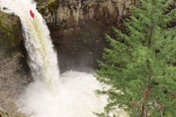 Evan Garcia kayaking waterfall