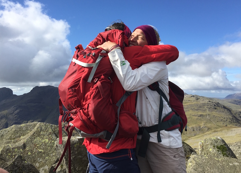 Hikers hugging