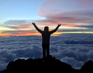 Jon Gupta on the summit of Mount Kilimanjaro