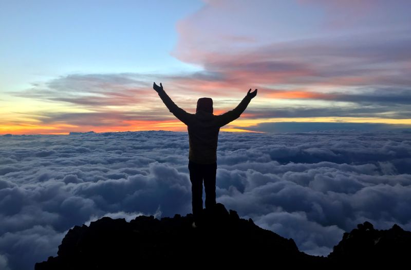 Jon Gupta on the summit of Mount Kilimanjaro