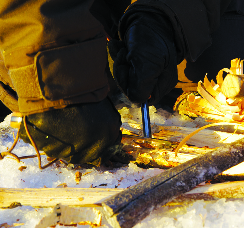 Lighting fire with a knife