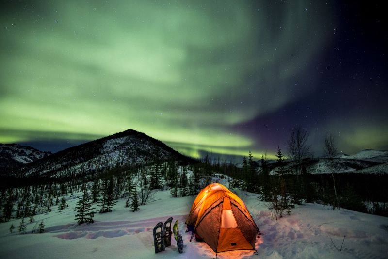 Wild camping under the Northern Lights in Yukon Canada