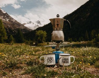 gas camping stoves in the mountains with kettle