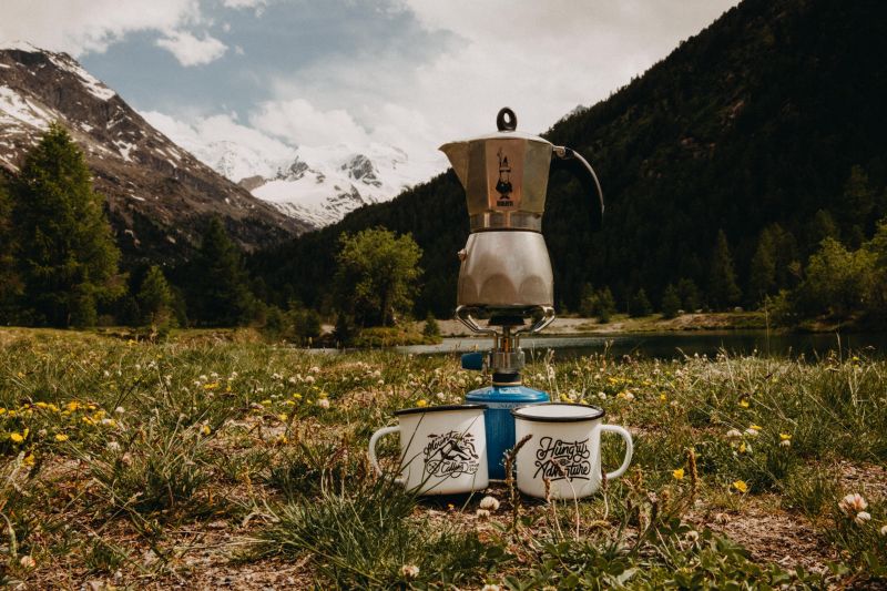 gas camping stoves in the mountains with kettle