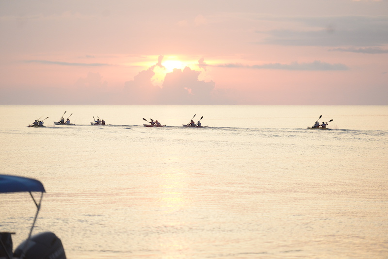 sunset belize sea kayaking event