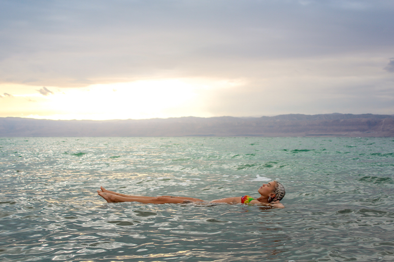 Floating in the Dead Sea, Jordan