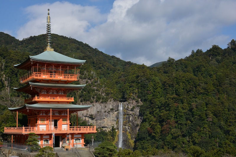 A view of a pagoda and waterfall on the Kumano Kodo Pilgrimage