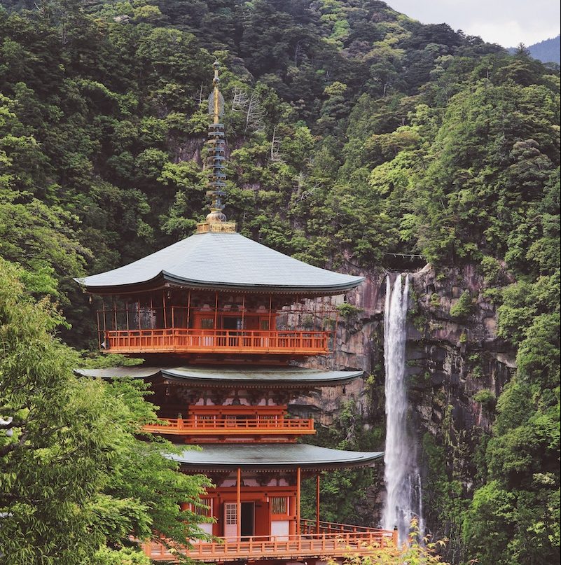 A view of a pagoda and waterfall on the Kumano Kodo Pilgrimage 