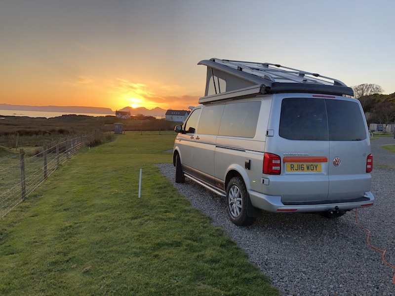 Our camper king van parked up on the west coast of Scotland watching the sunset
