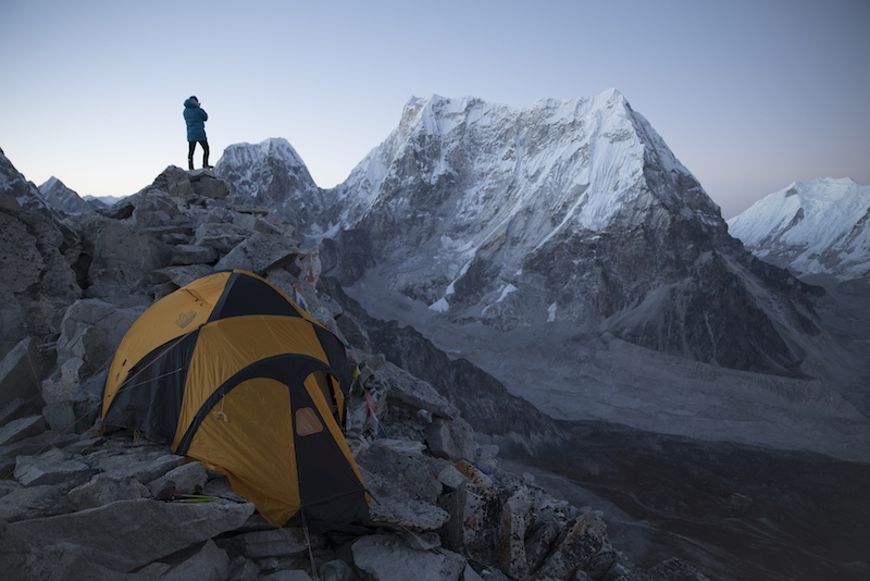 David Lama scouting Lunag Ri from Fox Peak during acclimatization on October 14, 2018