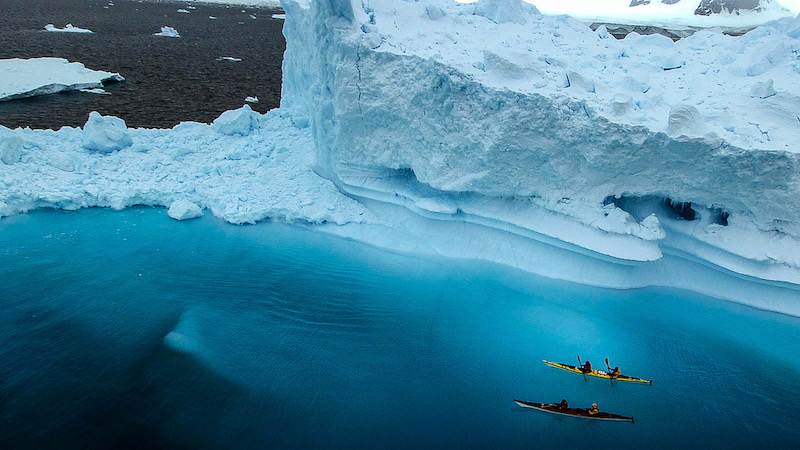 two kayakers in antarctica