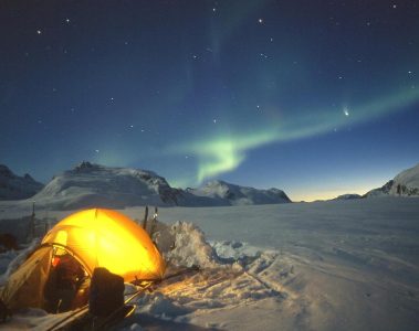 wilderness camping northern lights in east greenland
