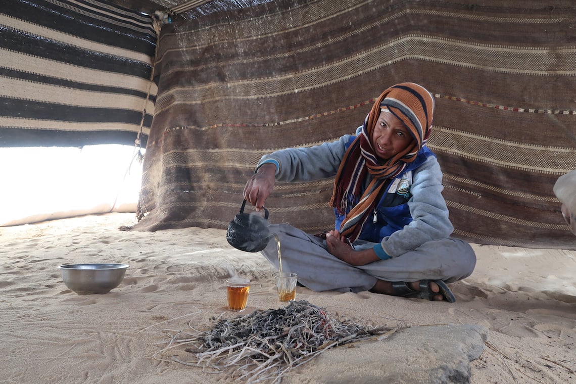 drinking tea in a bedouin tent on the jordan trail