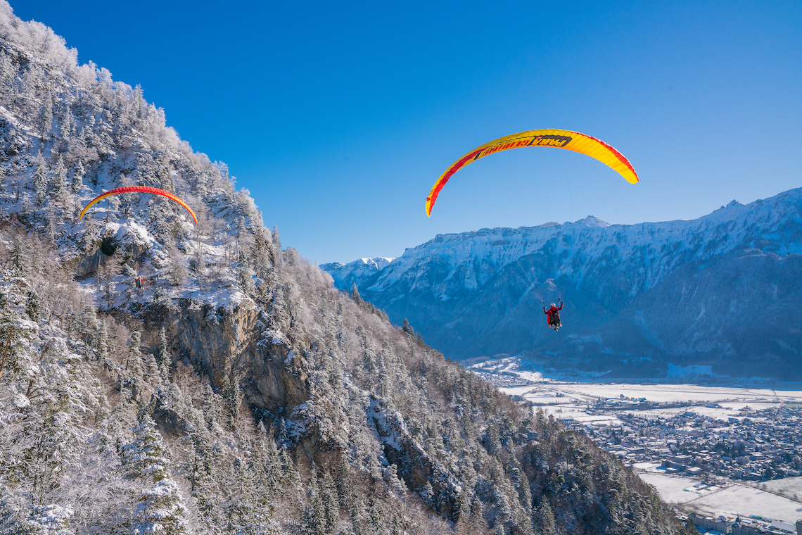 Paragliding winter adventure in Switzerland