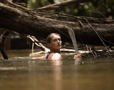 Laura deep in water with machette by Peiman Zekavat