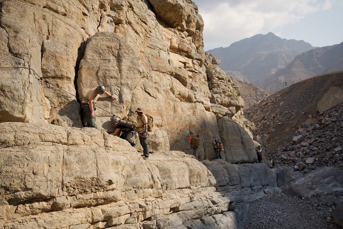 Traversing the wadi using ropes