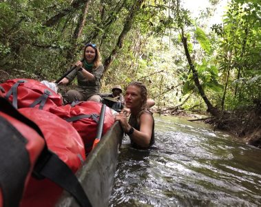 Pushing-a-wooden-dug-out-during-Essequibo-river-expedition