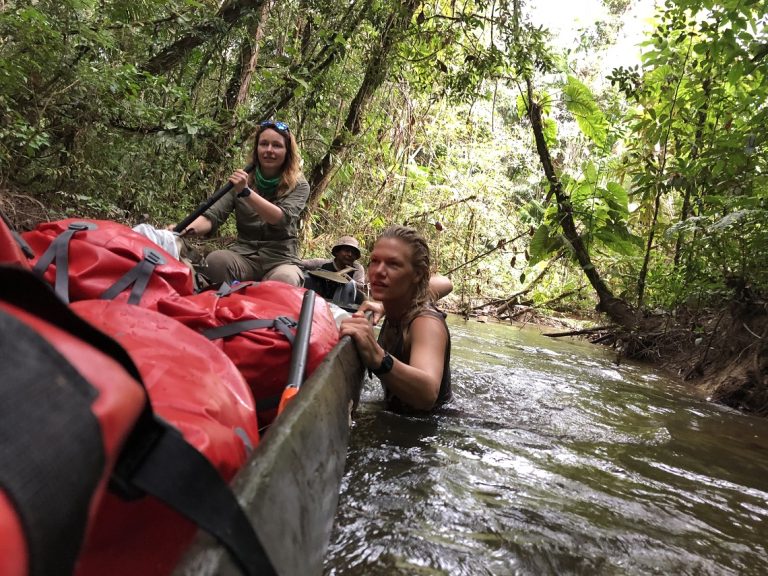 Pushing-a-wooden-dug-out-during-Essequibo-river-expedition