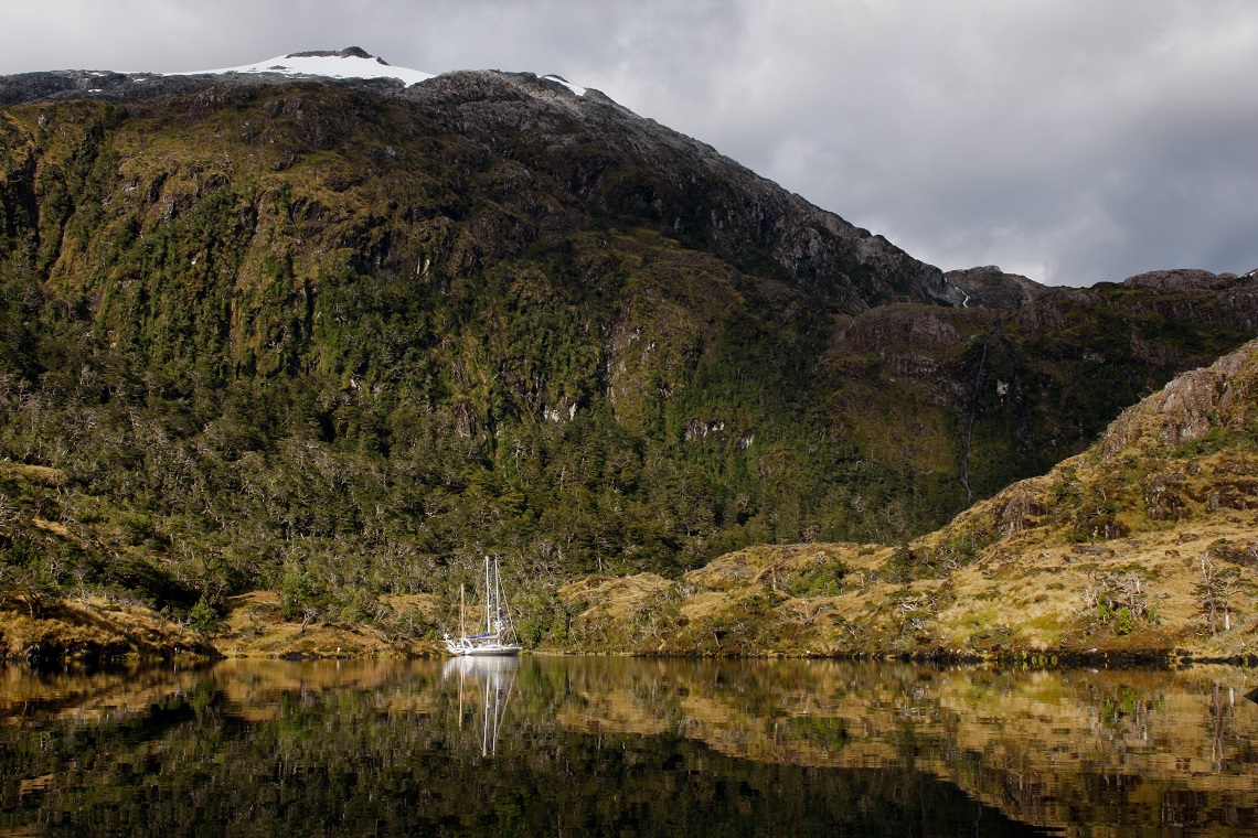 Mirror-like waters in a tranquil caleta or 'cove'