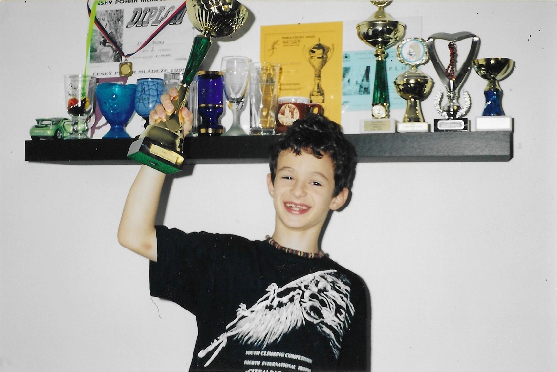 Young Adam celebrates another victory during his early competition years